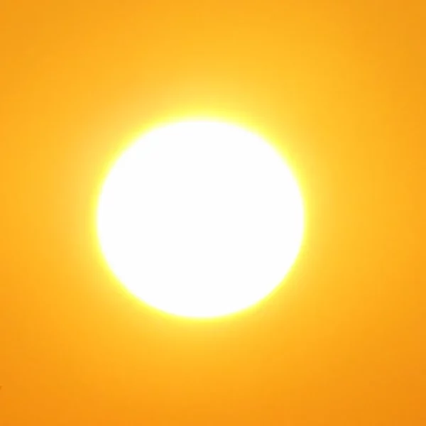 Un soleil brulant blanc et chaud, sur un fond orange